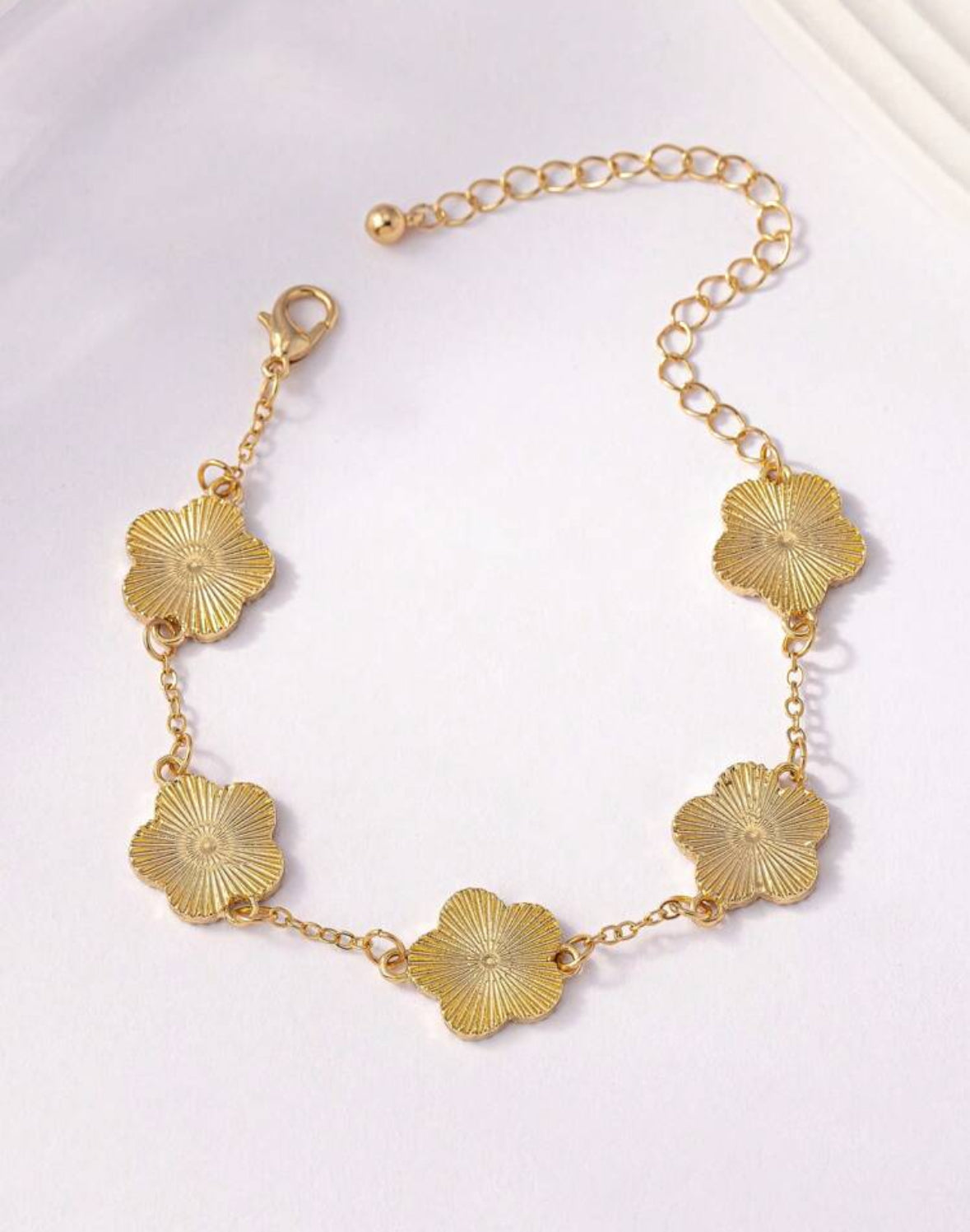 Golden clove bracelet