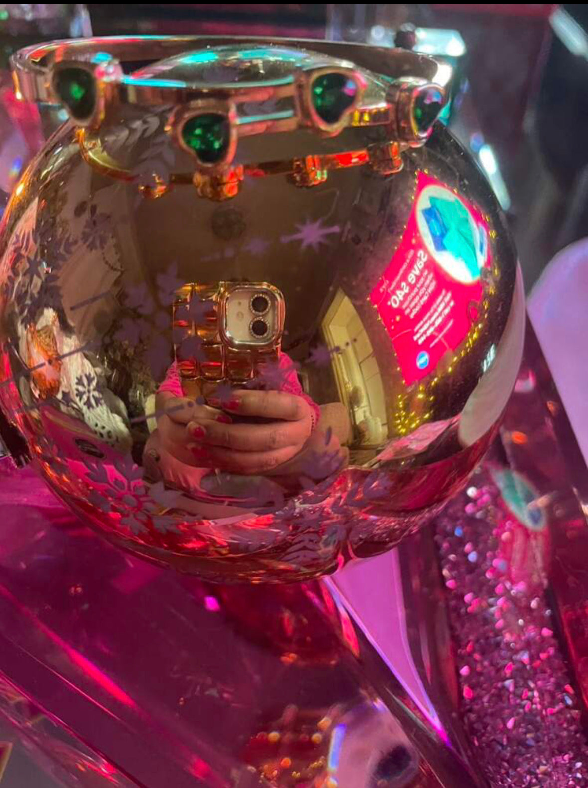 Green cubic zirconia heart bracelet.