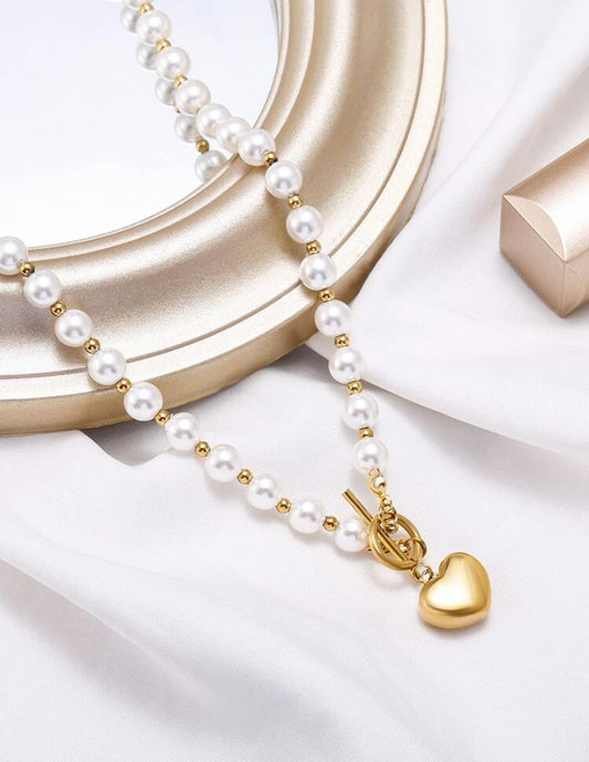 18k gold plated pearl heart charm necklace.