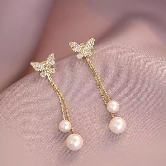 Elegant butterfly long pearl crystal earrings.