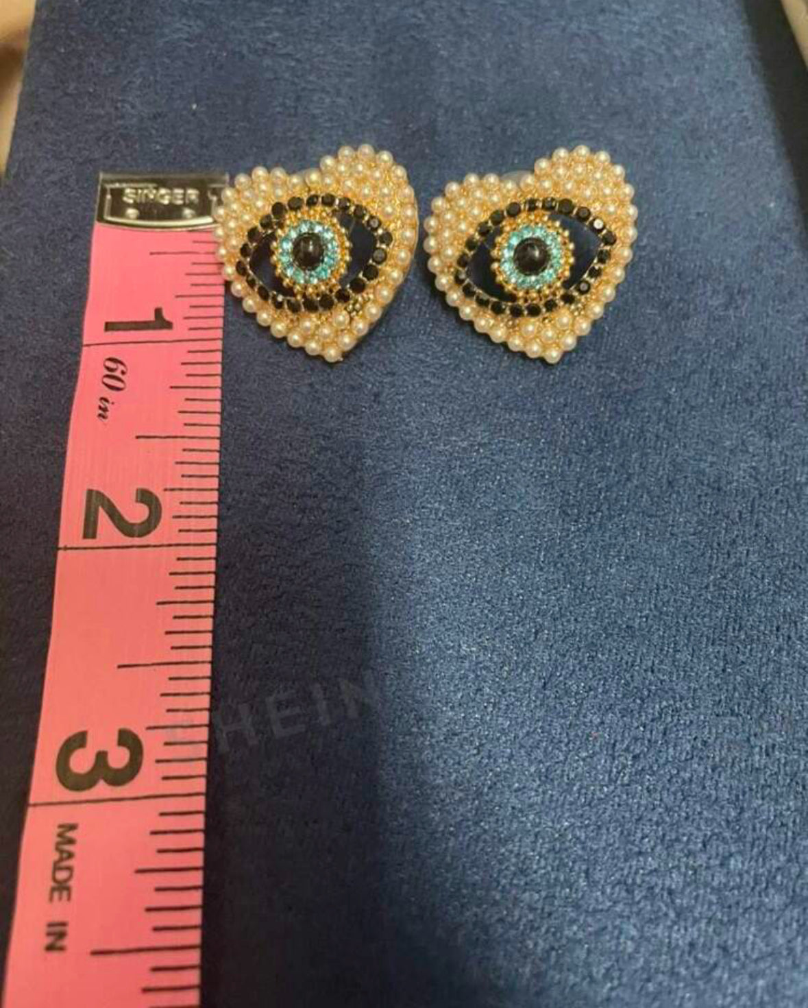 Two pair of heart shape earrings 