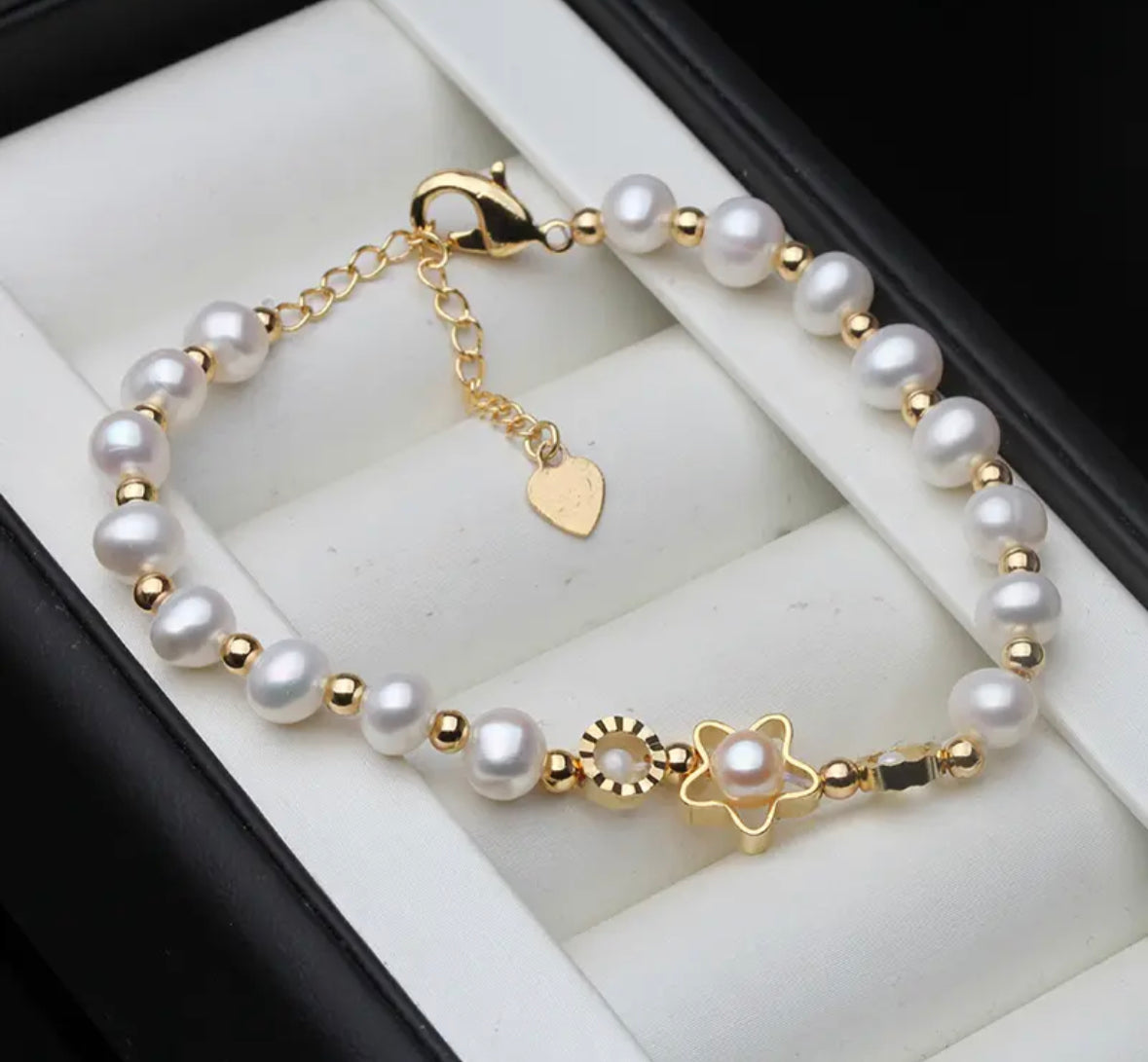 100% real freshwater round pearl bracelets.