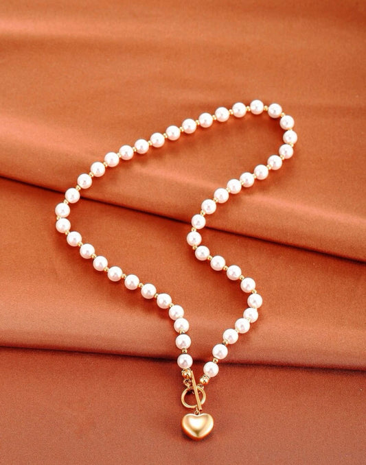 18k gold plated pearl heart charm necklace.