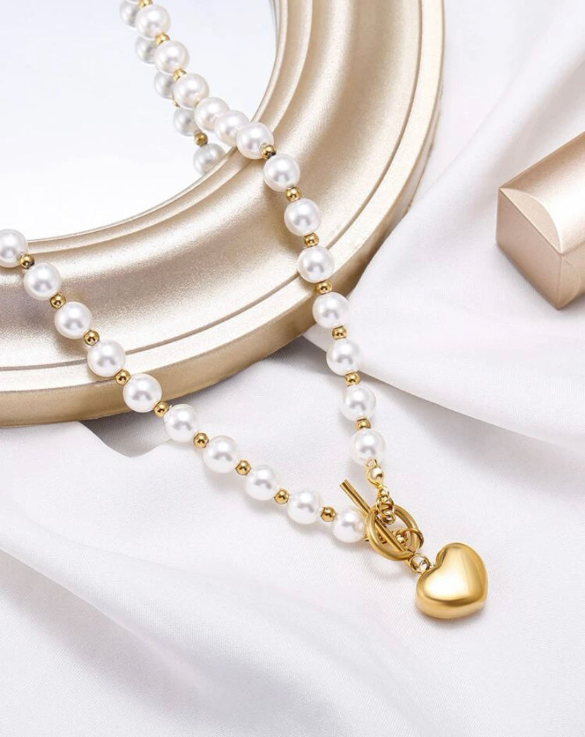 18k gold plated pearl heart charm necklace.